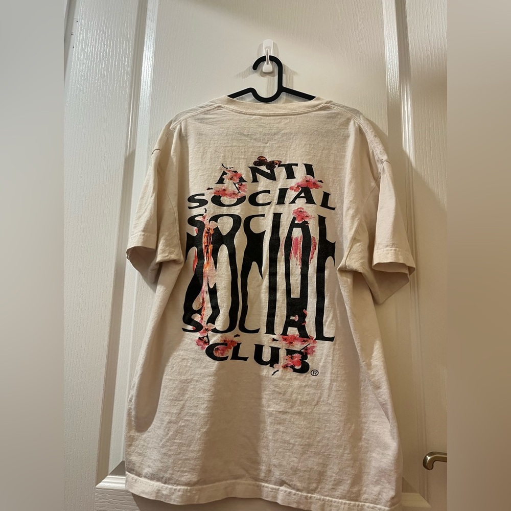 Anti social social club t shirt in white with flowers and a butterfly